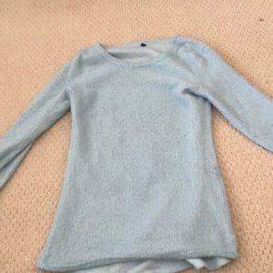 A baby blue sweater no zip no hood